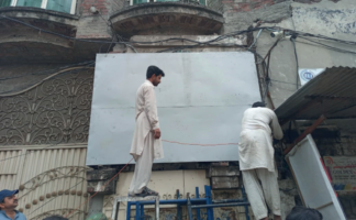 Minarets of Ahmadiyya mosque covered to escape demolition